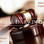 Gavel on table with overlay text reading "Obtaining an Expungement, Non-disclosure order, Case J. Darwin, INC."
