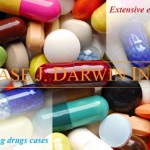 Various pills on a table with overlay text reading "Extensive experience In handling drug cases, Case J. Darwin, INC."